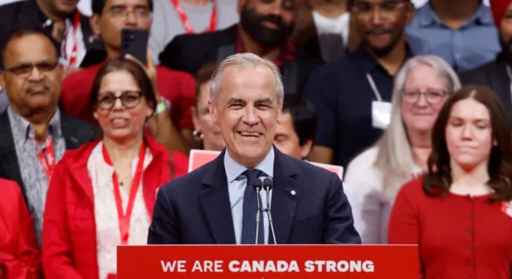 "Mark Carney at Canada elections 2025 rally with 'Carney for Canada' signs."