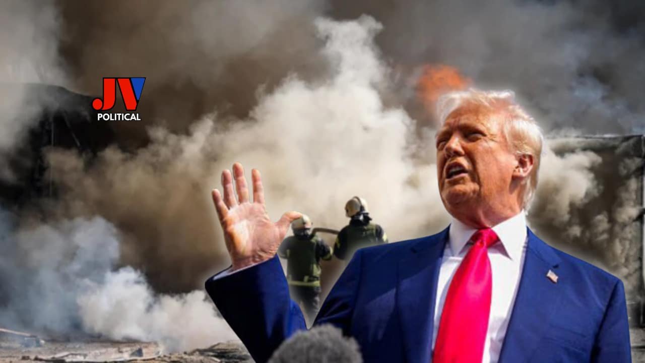 "Donald Trump in a blue suit and red tie, gesturing with his hand in front of a smoky, war-torn background with firefighters in the distance. The JV Political logo is in the top left corner, emphasizing a dramatic scene tied to Russia's largest drone strike on Ukraine since the war began."