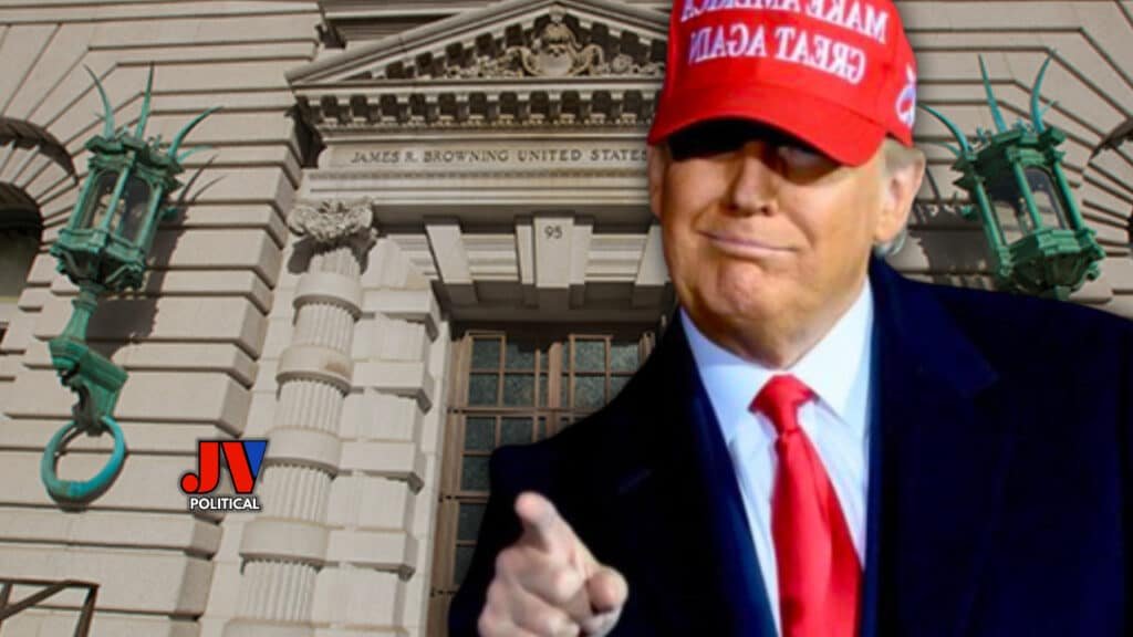 President Trump points confidently in front of the James R. Browning U.S. Courthouse, rocking his bold red MAKE AMERICA GREAT AGAIN cap, blue suit, and red tie. The iconic building stands tall behind him, symbolizing justice and strength. A powerful moment for patriots everywhere! #Trump2025 #MAGA #AmericaFirst #9thCircuit #LawAndOrder #MakeAmericaGreatAgain #JVPolitical #PatriotPride
