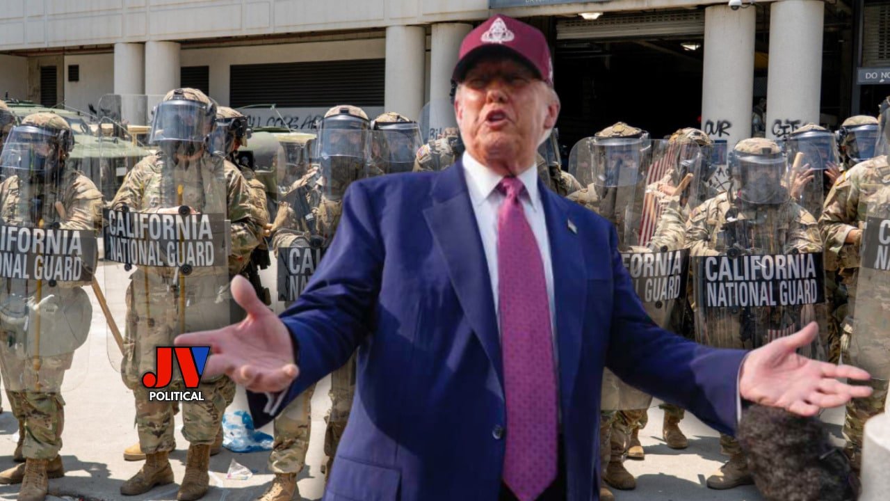 President Trump stands boldly in front of a line of California National Guard troops, arms outstretched, wearing his iconic red MAGA cap and a sharp blue suit with a bold pink tie. The troops, equipped with riot gear and shields, stand ready behind him as graffiti-covered buildings loom in the background. A proud moment for America First! #Trump2025 #MAGA #NationalGuard #LawAndOrder #AmericaFirst #LosAngeles #TrumpWins #PatriotPride #JVPolitical National Guard Stays Under Trump Control