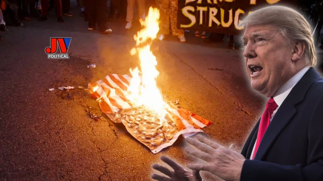 "Shocking scene from Day 4 of the LA Riots: An American flag burns on the streets as rioters demand the release of illegal alien criminals caught in ICE raids, with a 'STRUCTURE TO STRUGGLE' sign looming. President Trump, in a fiery stance, gestures passionately, symbolizing his National Guard deployment to restore order. Exclusive from JVPolitical.com! #LARiots2025 #TrumpSavesLA #MAGA"